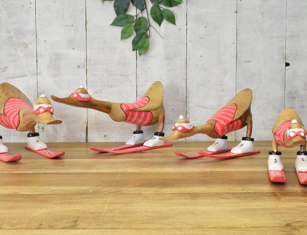 Wooden painted skiing duck